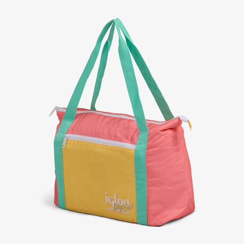 Angle View | Retro Packable Puffer 20-Can Cooler Bag::Flamingo::Compressible design