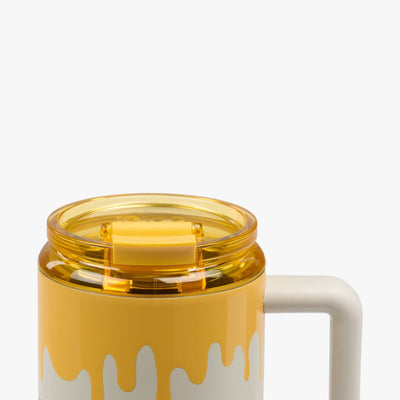 Lid Closed View | Disney Winnie the Pooh Hunny Pot 32 Oz Travel Mug::::Tinted leakproof flip ‘n’ sip lid