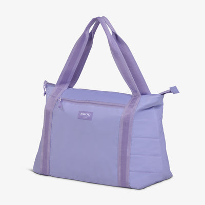Angle View | Packable Puffer 20-Can Cooler Bag::Lilac::Made with recycled fiber