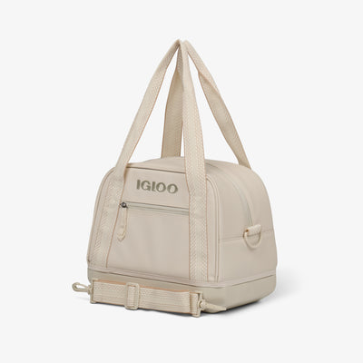 Angle View | Tag Along Too 12-Can Satchel Cooler::Luxe Linen::Storage pocket