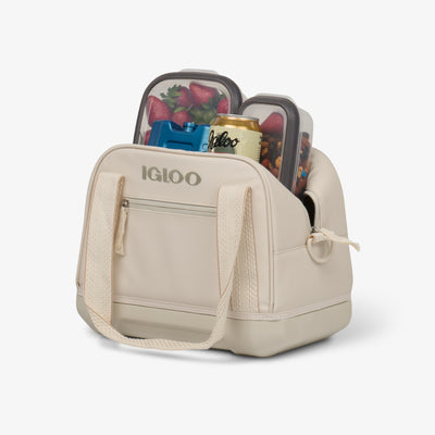 Packed View | Tag Along Too 12-Can Satchel Cooler::Luxe Linen::Durable EVA base