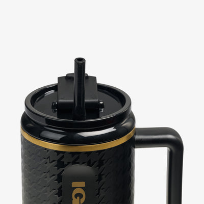 Angle View | 32 Oz Flip ‘n’ Sip Travel Mug::Luxe Black::Gasketed, leak-resistant straw