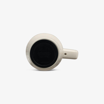 Angle View | 32 Oz Flip ‘n’ Sip Travel Mug::Luxe Linen::Built-in coaster